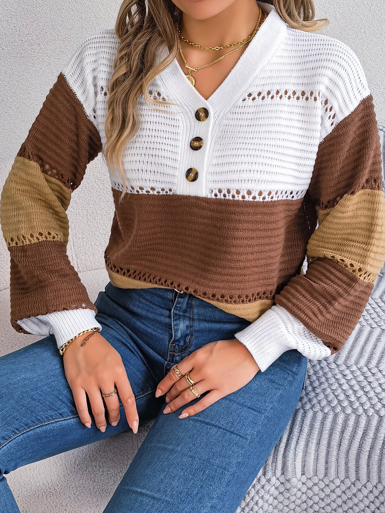 V-neck hollowed out color blocked lantern sleeve sweater