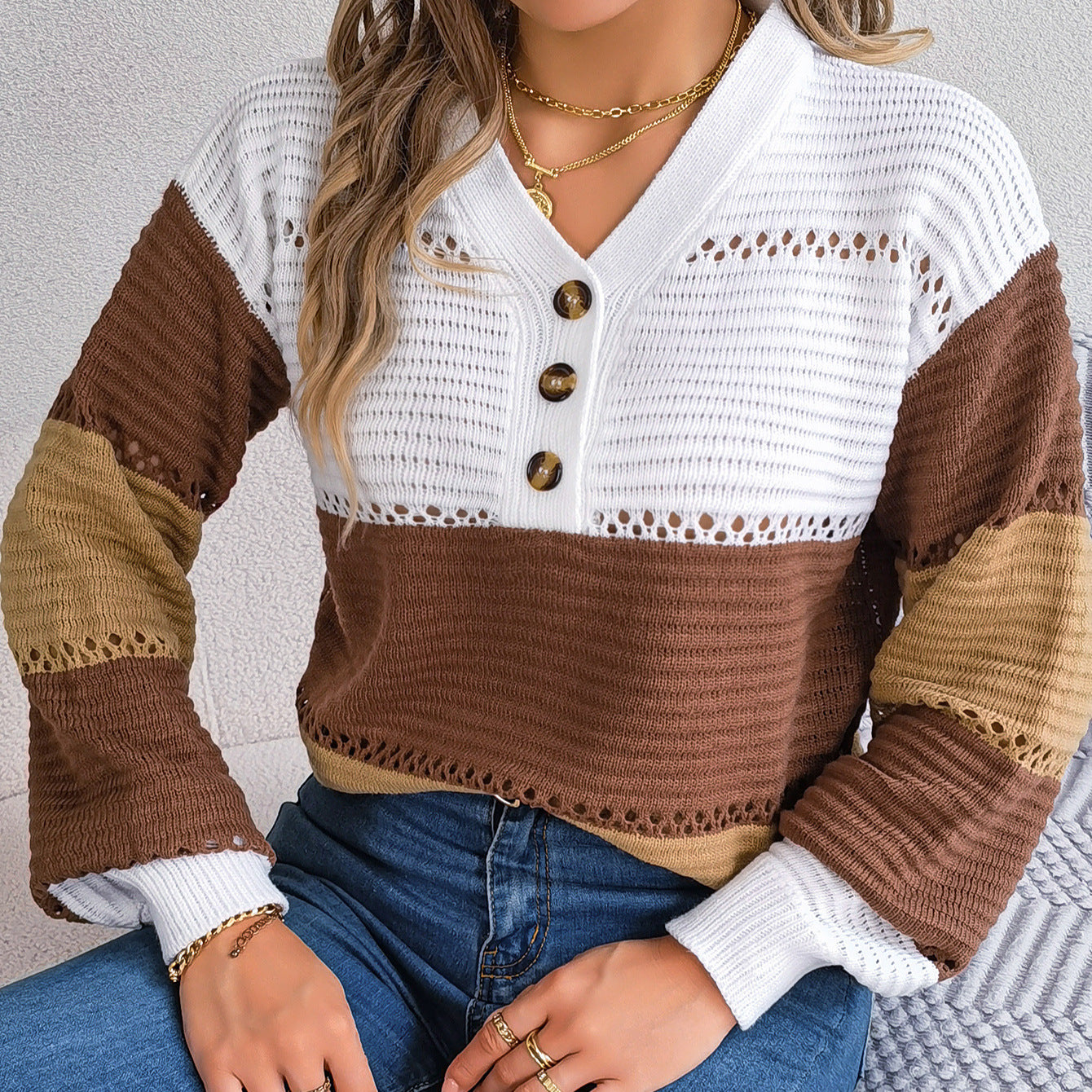 V-neck hollowed out color blocked lantern sleeve sweater
